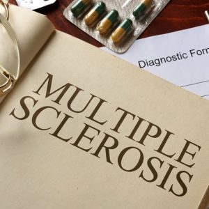 Book with diagnosis multiple sclerosis.