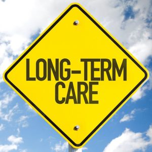 Long-Term Care sign with sky background.